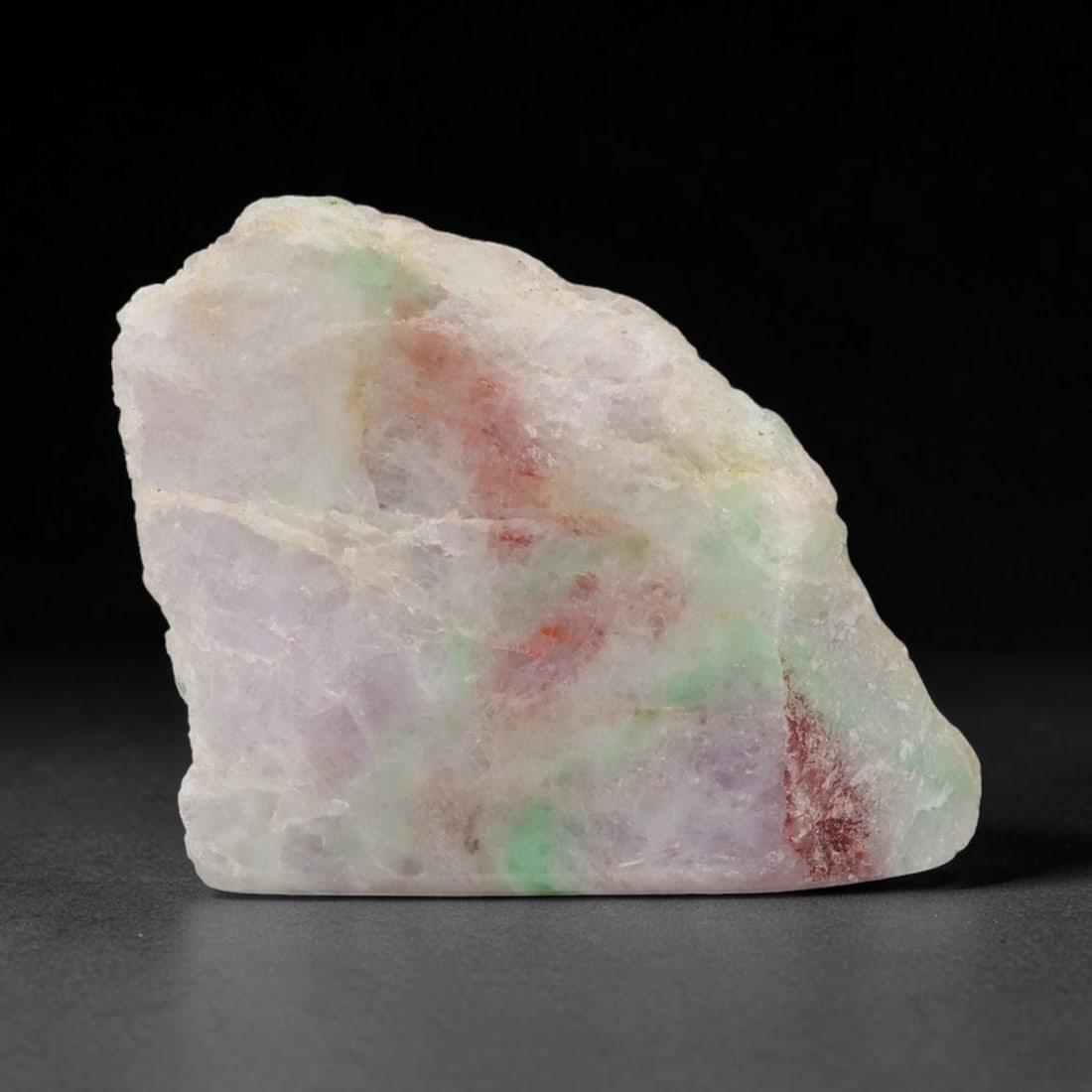 188ct Natural Type A Burmese Jadeite Jade Sliced Rough, 33FD: This specimen is a sliced rough block of natural Type A Burmese jadeite jade. The interior displays natural colour zoning with visible mineral veining and crystalline patterns typical of unprocessed j