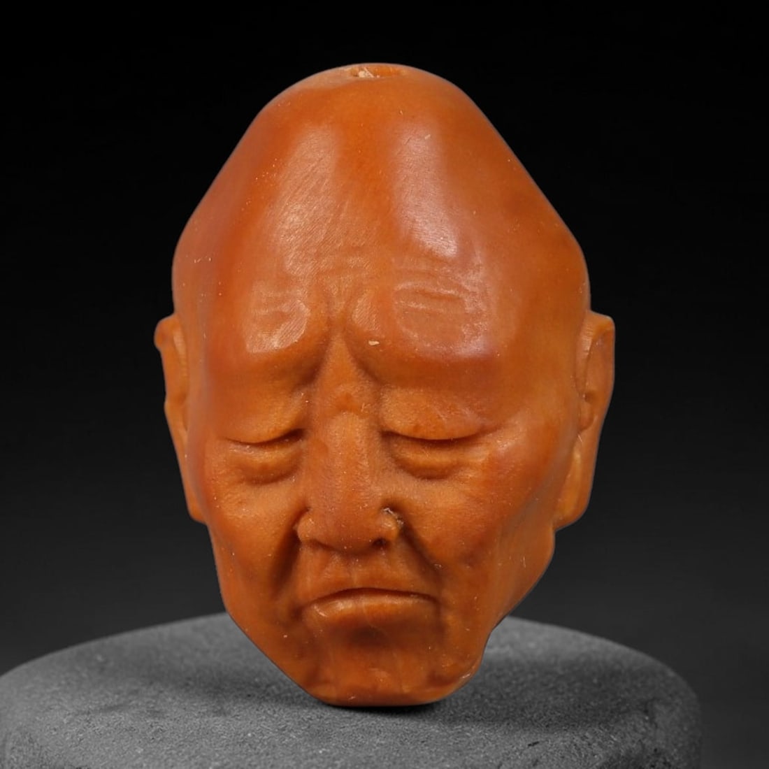 A Chinese Carved Natural Olive Nut Drilled Art Bead, 42BZ: Traditional craft bead carved from solid natural olive nut core, representing a classic miniature Chinese micro-carving folk art piece with a pre-drilled suspension bore integrated for easy threading 