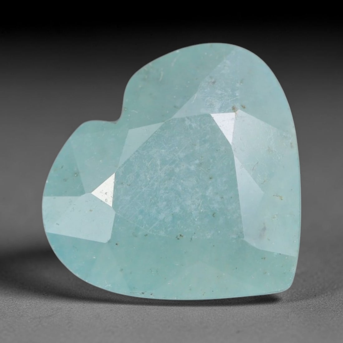 4.03ct Natural Madagascan Faceted Grandidierite Rare Loose Gemstone, 55BD: This expertly faceted finished grandidierite holds soft translucent body tone with fine faint natural internal veining visible beneath precisely cut reflective facets within its 11.8x10.9x5.8mm calibr