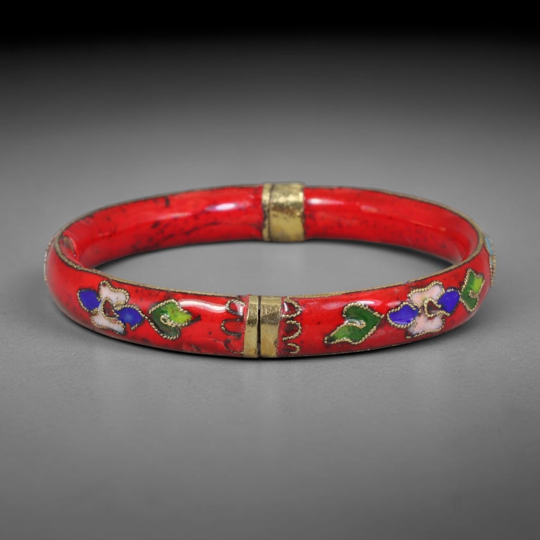 Vintage Chinese Cloisonne Bangle - Red Floral Enamel Bracelet, 71FD: Constructed with silvered metal base finished in traditional Chinese cloisonne wire filigree work, the bangle features a vibrant scarlet enamel ground inlaid with segmented floral motifs in green, dee