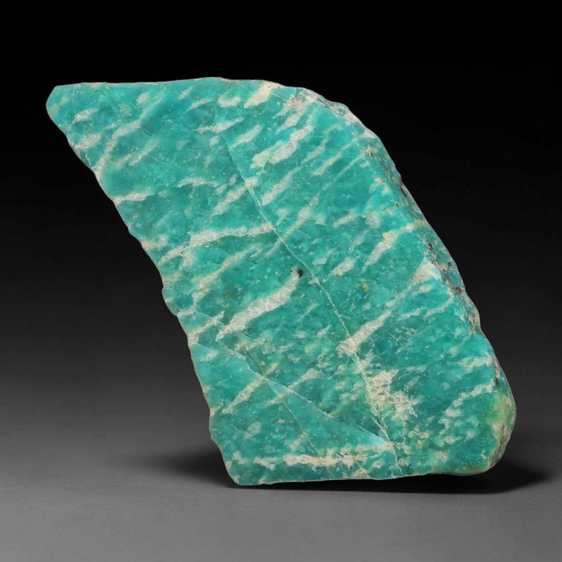 65ct Natural Russian Ural Amazonite Slab Rough, 95EB: This intact amazonite slab features distinct parallel mineral banding running uniformly across its naturally split flat surface within 41x27x7mm slab dimensions, retaining unmodified natural geologica