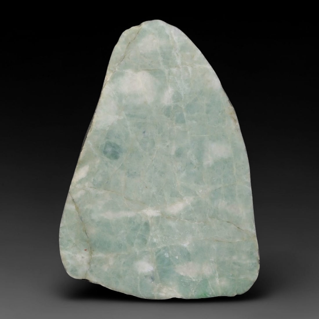 375ct Natural Type A Burmese Jadeite Jade Sliced Rough, 43AZ: This specimen is a sliced rough block of natural Type A Burmese jadeite jade. The interior displays natural colour zoning with visible mineral veining and crystalline patterns typical of unprocessed j