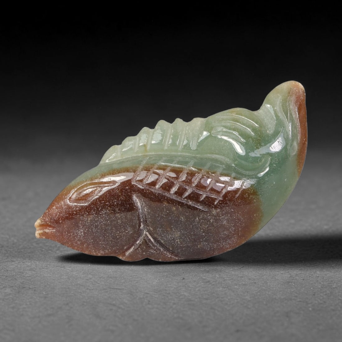 Natural Burmese Type A Jadeite Jade Hand Carved Pendant, 11BQ: Artisan hand-carved untreated Burmese Type A jadeite jade pendant measuring 35x17 mm. Carefully sculpted with detailed relief craftsmanship and finished with a smooth glossy polish. Authentic Type A j
