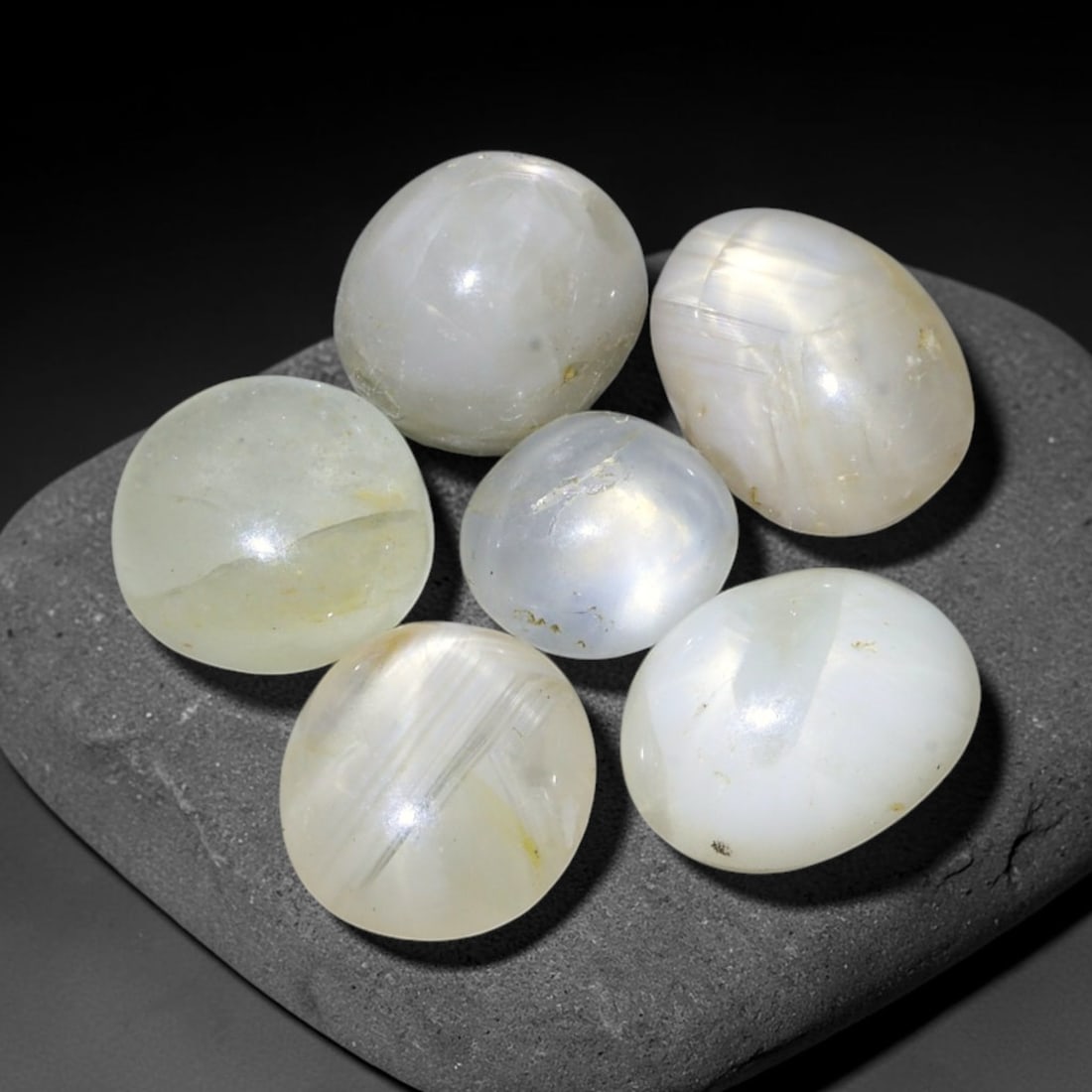 9.63ct Natural Unheated Burmese Star Sapphire Loose Gemstone Parcel, 66BZ: This parcel contains natural unheated star sapphire originating from Myanmar. The gem material displays soft pale blue and lavender hues, with characteristic silk inclusions that create the desirable 