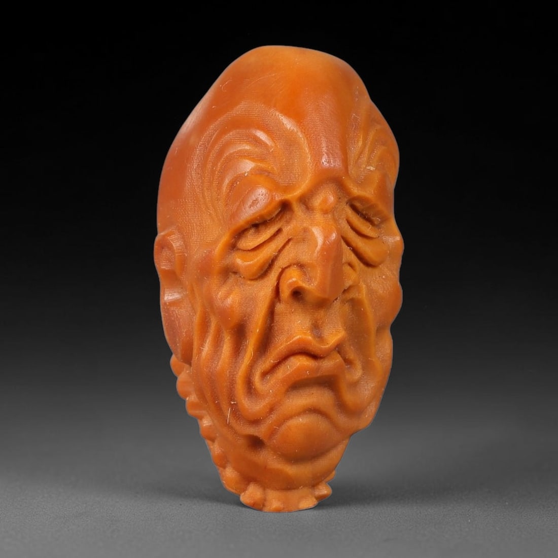 A Chinese Carved Natural Olive Nut Drilled Art Bead, 29BZ: Traditional craft bead carved from solid natural olive nut core, representing a classic miniature Chinese micro-carving folk art piece with a pre-drilled suspension bore integrated for easy threading 