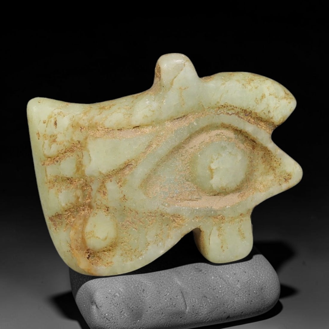 Ancient Egyptian Late Period Serpentine Wedjat Eye Amulet (664-30 BCE), 89AE: Hand-carved pale serpentine stone depicting the sacred Wedjat Eye of Horus, a core funerary talisman symbolizing protection, healing and wholeness. Distinct recessed carving outlines the eye and tear 