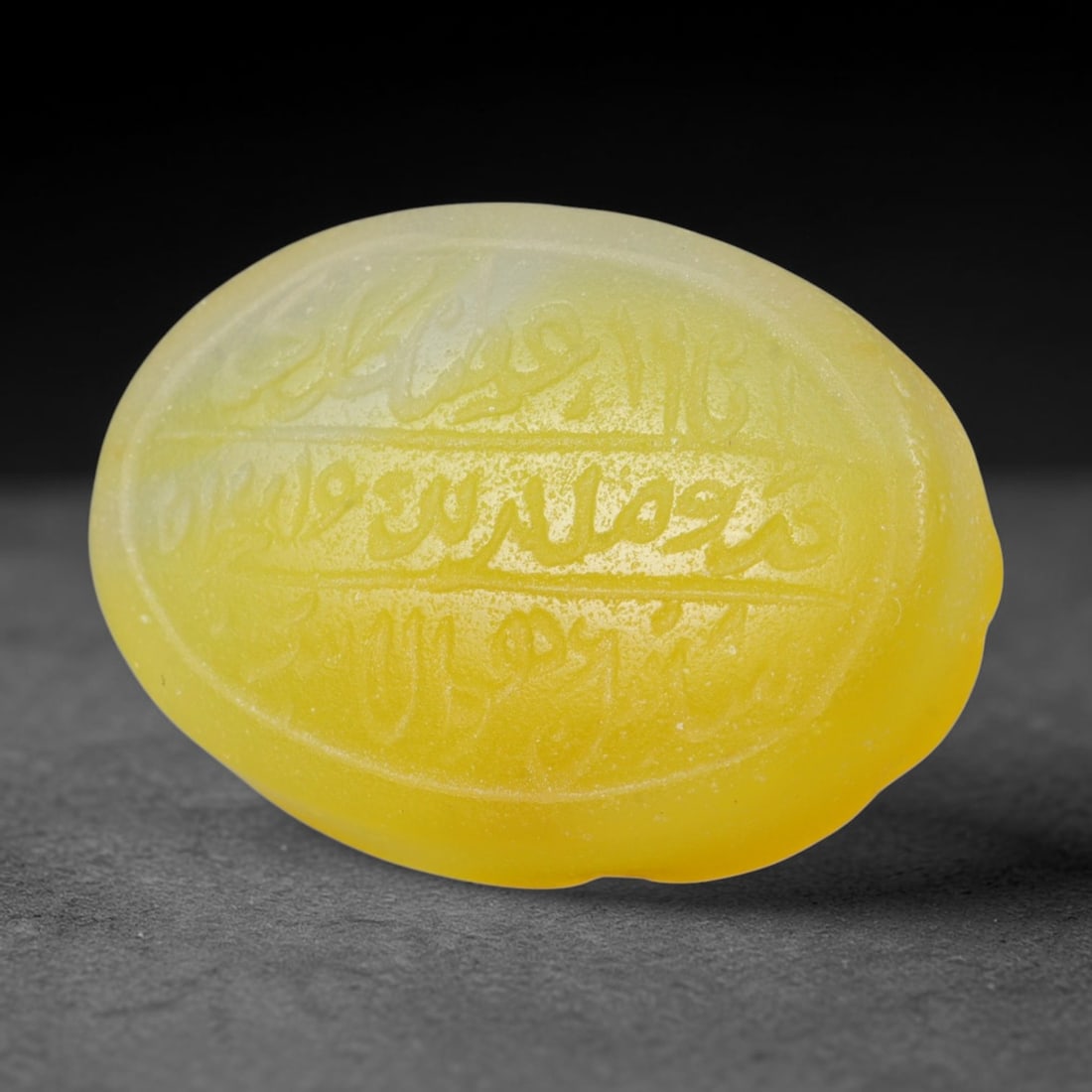 Antique Islamic Qajar / Late Ottoman Agate Calligraphic Talisman Seal (1700-1900 CE), 73FP: Genuine fully hand-carved oval agate seal, entirely crafted by hand without machine tooling, identifiable by organic, uneven hand-cut engraving texture throughout the calligraphic field. The stone bea