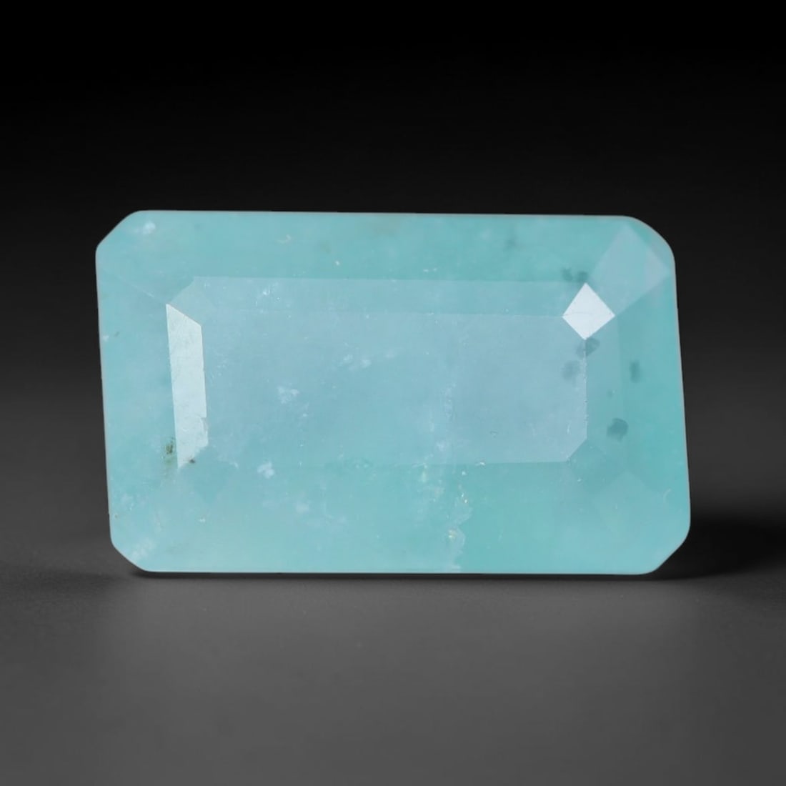 4.26ct Natural Madagascan Faceted Grandidierite Rare Loose Gemstone, 89AS: This expertly faceted finished grandidierite holds soft translucent body tone with fine faint natural internal veining visible beneath precisely cut reflective facets within its 13.3x7.7x5.2mm calibra