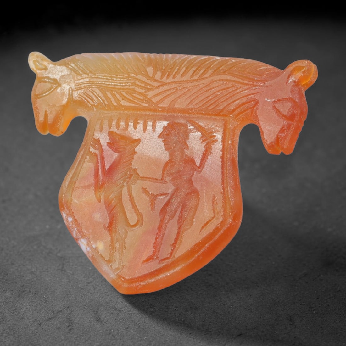 Vintage Natural Carnelian Agate Revival Indo-Persian Glyptic Figural Talisman Amulet Plaque, 51FK: This vintage talisman pendant plaque is skillfully carved from natural banded carnelian agate, crafted in a style referencing ancient Indo-Persian glyptic art traditions. The face bears detailed relie