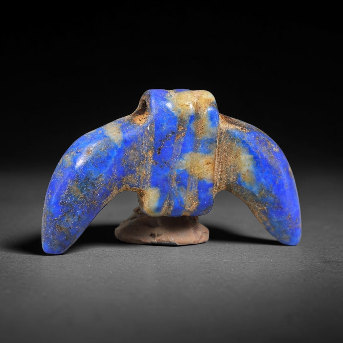 Ancient Medieval Sasanian Persian Culture Lapis Lazuli Amulet (224-651 CE), 13EC: This antique carved lapis lazuli amulet originates from Sasanian Persian Culture, a civilization famed for crafting rich blue lapis talismans sourced from Afghanistan's mining regions. The surface bea