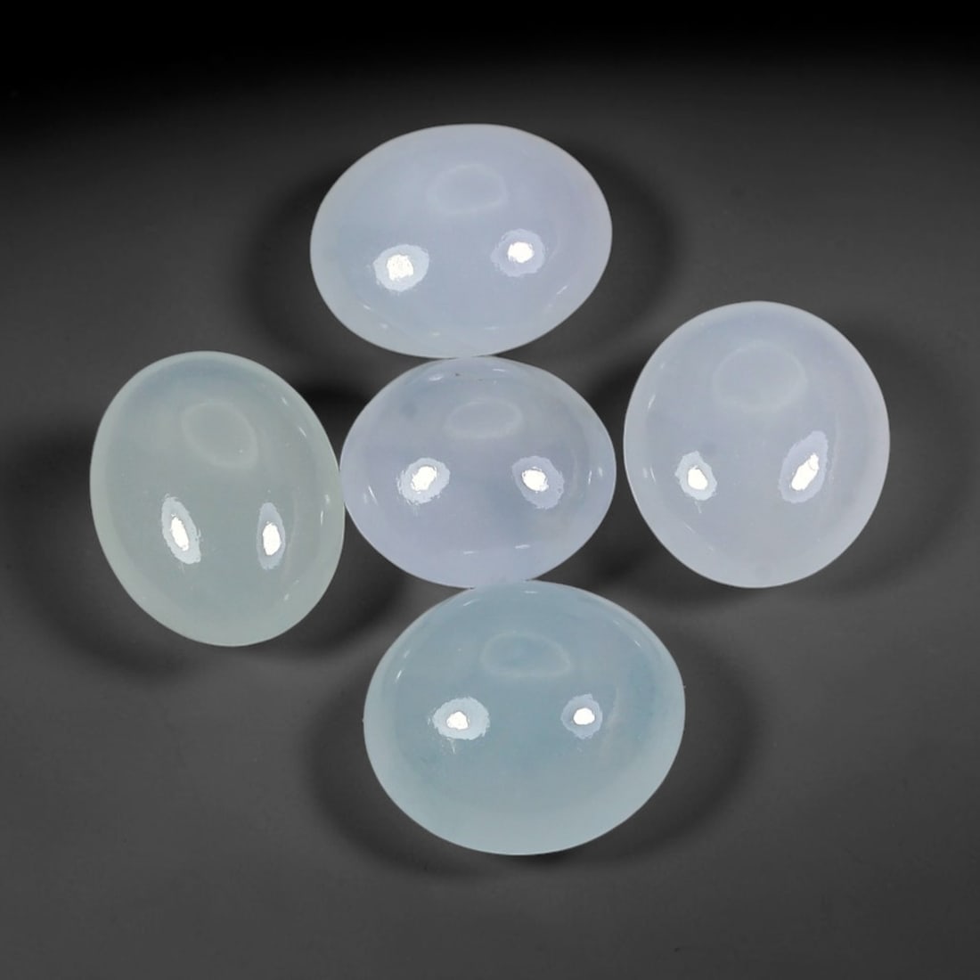 12.51ct Natural Burmese Type A Icy Grade Jadeite Jade Cabochon Loose Gemstone Lot, 43FJ: This natural Burmese Type A jadeite jade cabochon lot features attractive icy translucent body with smooth polished surfaces. Dimensions measure 10x9x4mm, sourced from Myanmar, these polished cabochon