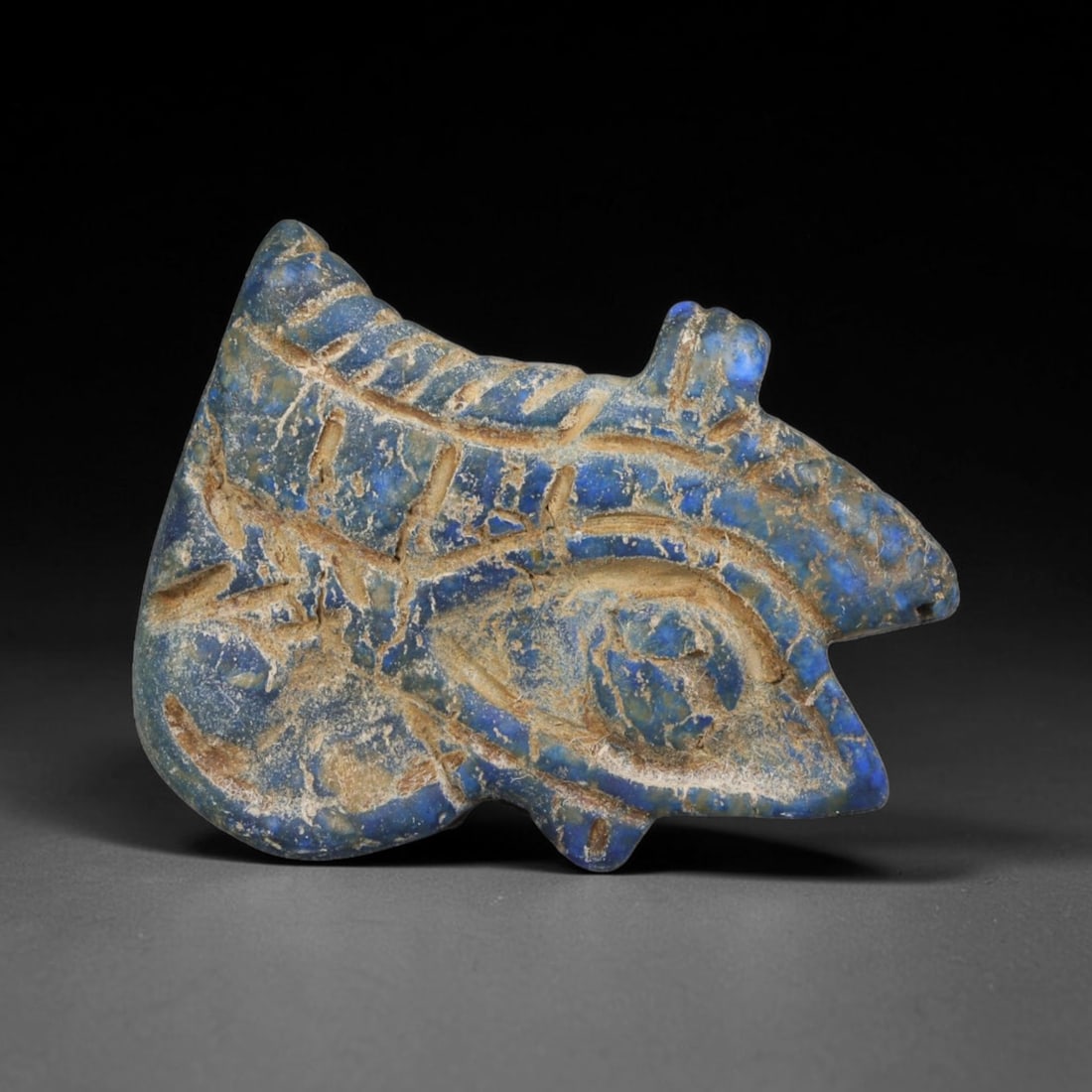 Ancient Predynastic & Pharaonic Egyptian Lapis Lazuli Wedjat Eye Amulet (4000 BCE-30 CE), 92ED: This ancient lapis lazuli Wedjat Eye amulet originates from Predynastic & Pharaonic Egyptian Civilization, one of the most recognizable protective funerary and talismanic motifs of ancient Egypt, craf