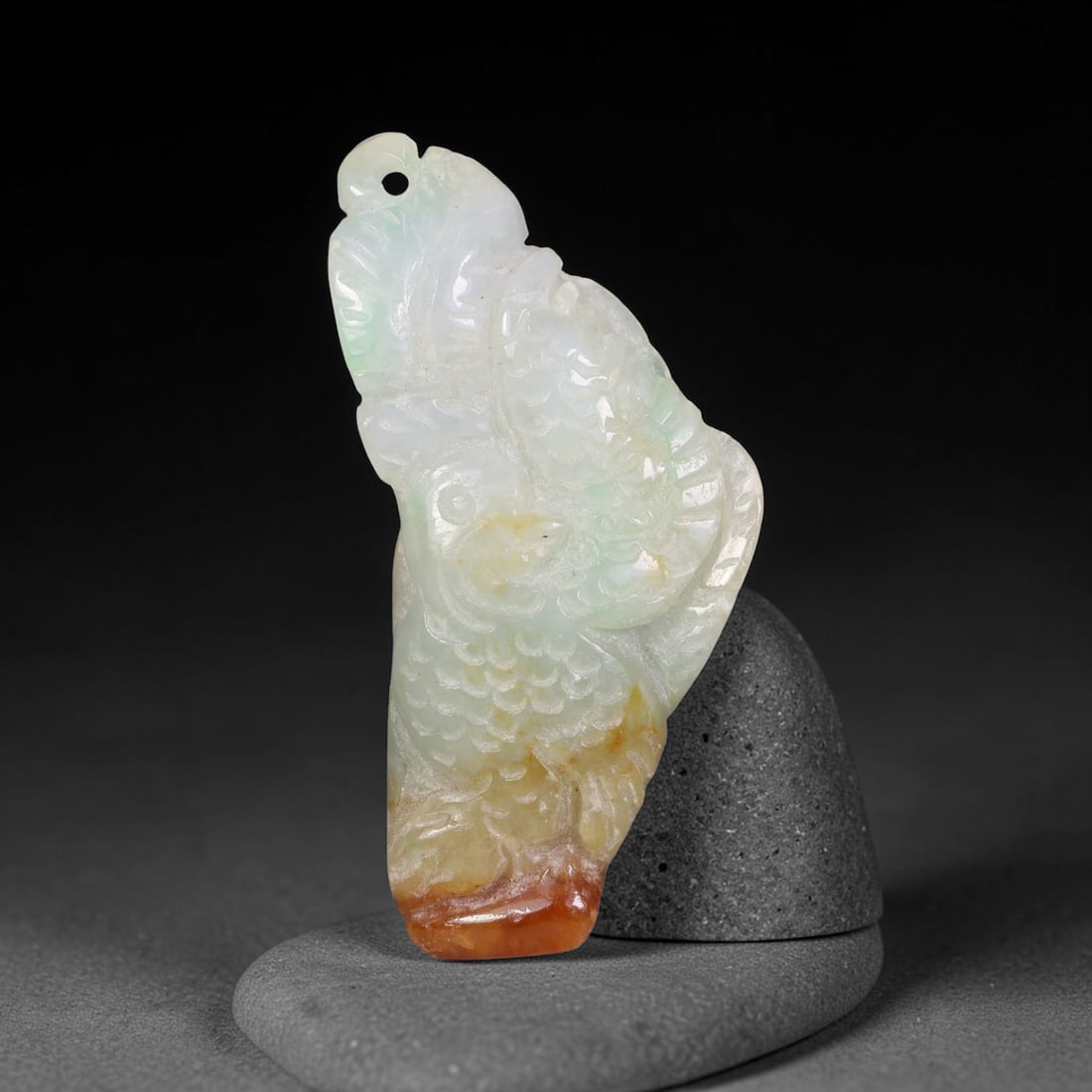 Natural Burmese Type A Jadeite Jade Hand Carved Pendant, 13EF: Artisan hand-carved untreated Burmese Type A jadeite jade pendant measuring 49x21 mm. Carefully sculpted with detailed relief craftsmanship and finished with a smooth glossy polish. Authentic Type A j