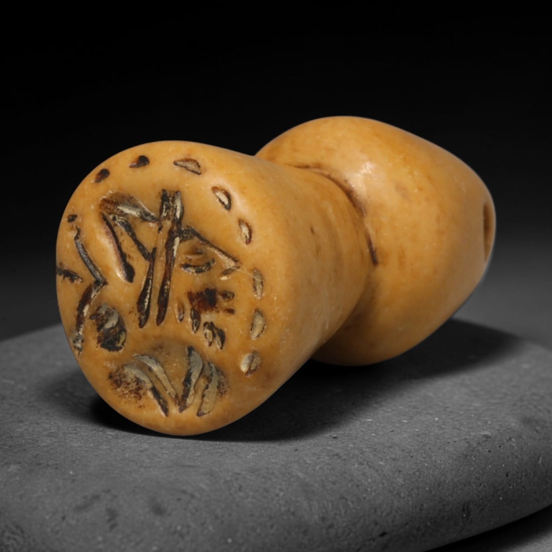 Ancient Sogdian Columnar Stamp Seal (500 BCE-800 CE), 41ED: This carved pale ochre stone columnar stamp seal originates from Sogdian Culture, the renowned Silk Road trading civilization of Central Asia. The circular seal face displays a finely incised noble mo