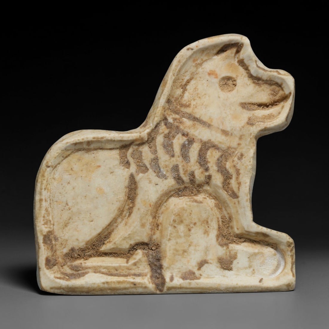 Ancient Sasanian Persian Lion Effigy Stamp Seal (224-651 CE), 75ED: This carved pale stone stamp seal originates from the Sasanian Persian Empire, where lion imagery served as a powerful royal and protective talisman motif within Zoroastrian cultural traditions. The o