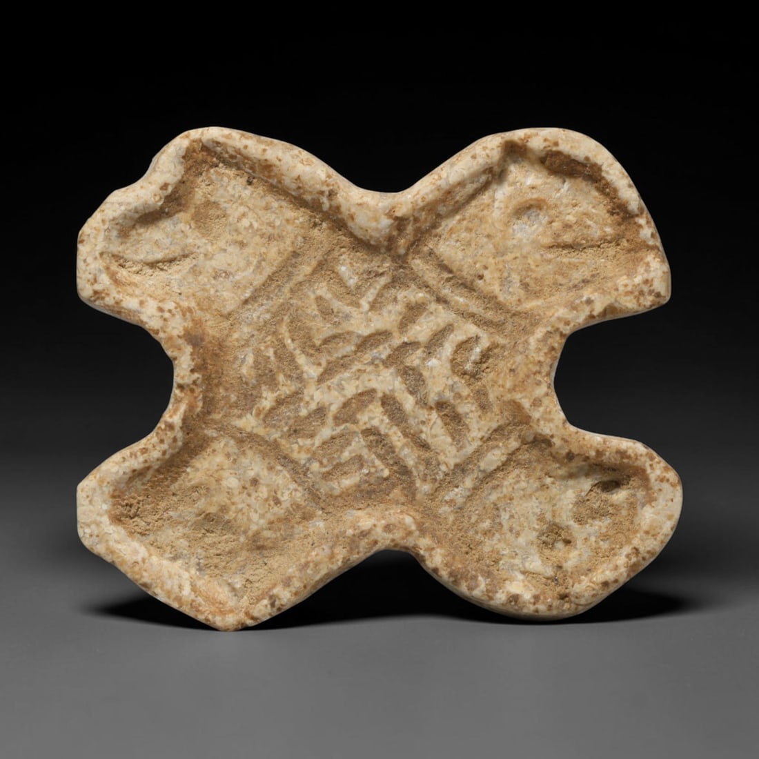Ancient Sasanian Persian Four Lion Head Stamp Seal (224-651 CE), 69ED: This carved pale stone stamp seal originates from the Sasanian Persian Empire, where multi-lion iconography embodied royal authority and protective spiritual power within Zoroastrian belief systems. T
