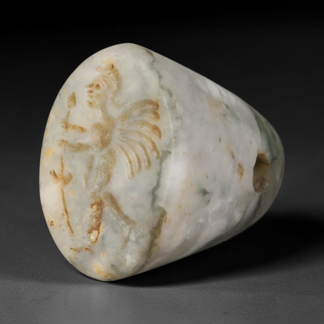 Ancient Sasanian Persian Conoid Stamp Seal (c.224-651 CE), 85ED: This pale mottled stone conoid stamp seal originates from Ancient Sasanian Persian culture. The oval sealing face bears finely incised figural imagery crafted within established regional artistic trad