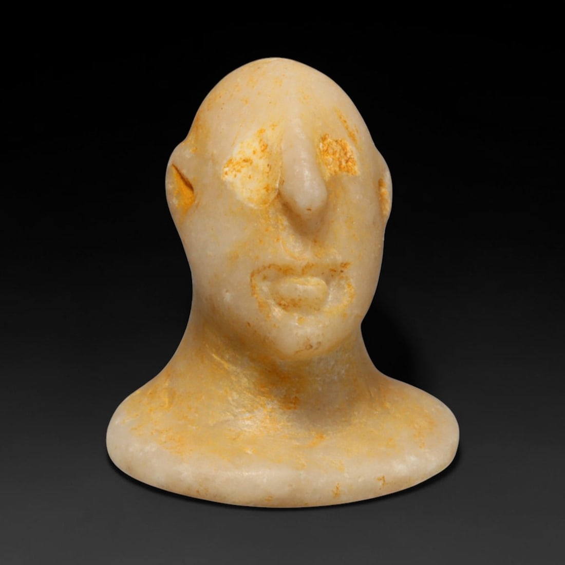Ancient Bactrian Marble Idol Head (250 BCE-200 CE), 42ED: This carved pale marble idol head originates from Greco-Bactrian Culture, a significant Silk Road civilization blending Hellenistic and Central Asian artistic traditions. The simplified facial feature