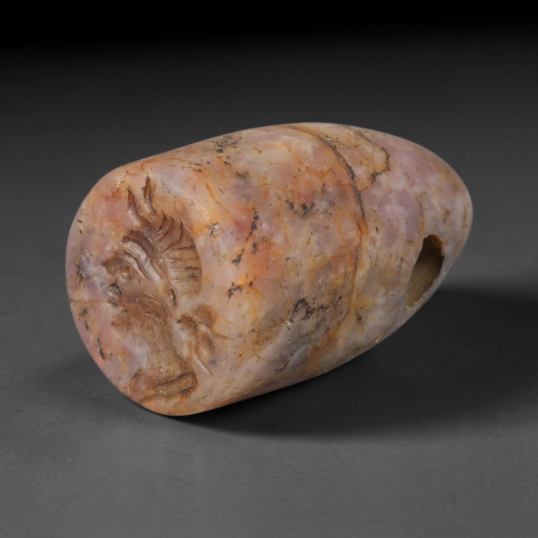 Ancient Sasanian Persian Pink Quartz Conical Stamp Seal (224-651 CE), 88ED: This antique pink quartz conical stamp seal originates from Ancient Sasanian Persian civilisation, serving both as a functional seal to create clay impressions and a wearable protective talisman. The 