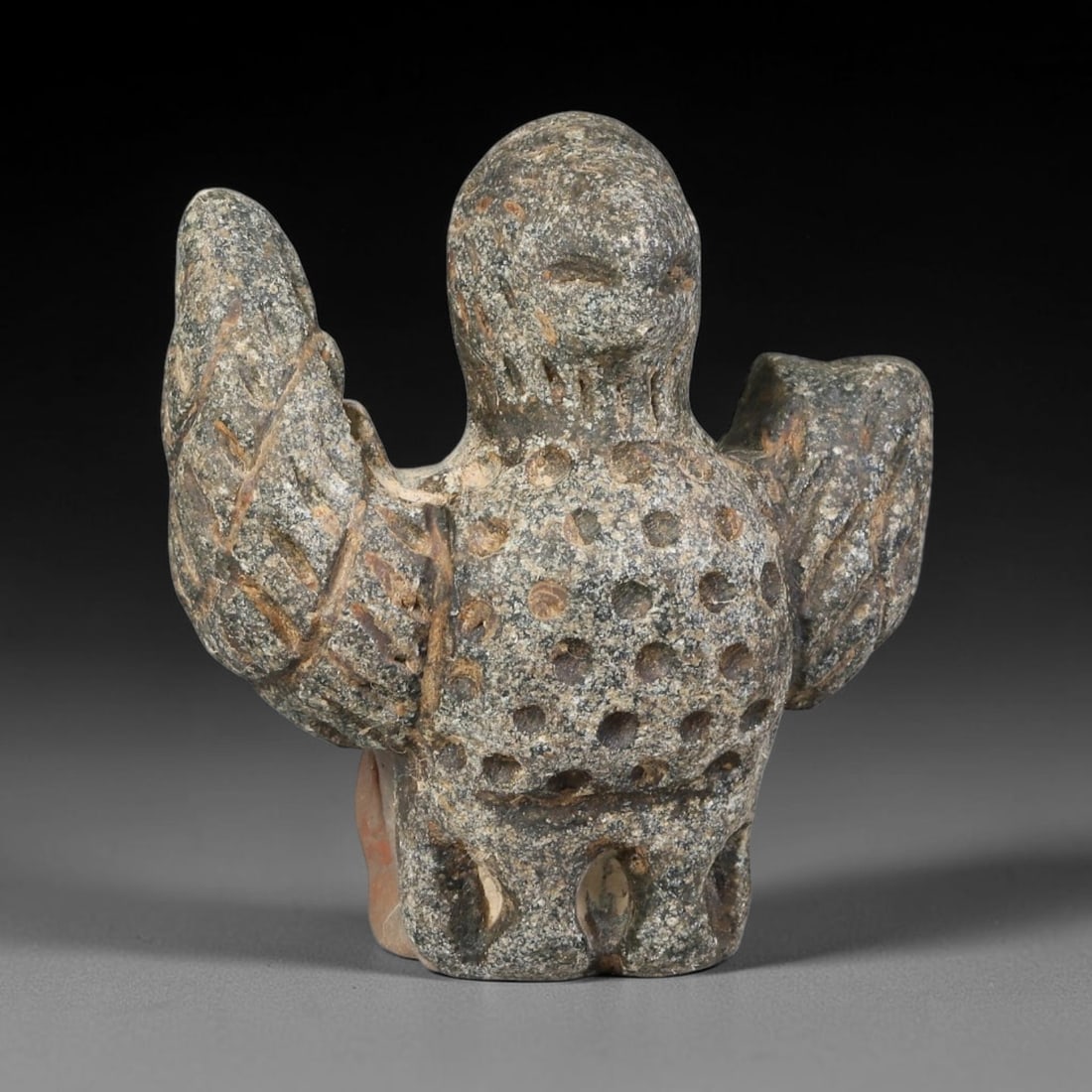 Ancient Neo-Hittite Dark Stone Vulture Figurine Amulet (1200-800 BCE), 22EF: This solid carved amulet is crafted from speckled dark stone, originating from Iron Age Neo-Hittite cultures of Northern Syria and Eastern Anatolia, modelled as a standing vulture with partially raise