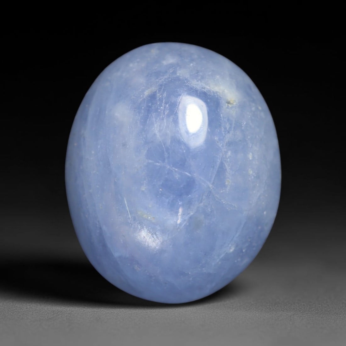 4.45ct Natural Unheated Burmese Blue Star Sapphire Oval Cabochon Loose Gemstone, 46BQ: This smoothly polished oval cabochon features natural Burmese blue star sapphire, formed with densely aligned rutile needle inclusions required to produce asterism. The gently domed surface is expertl