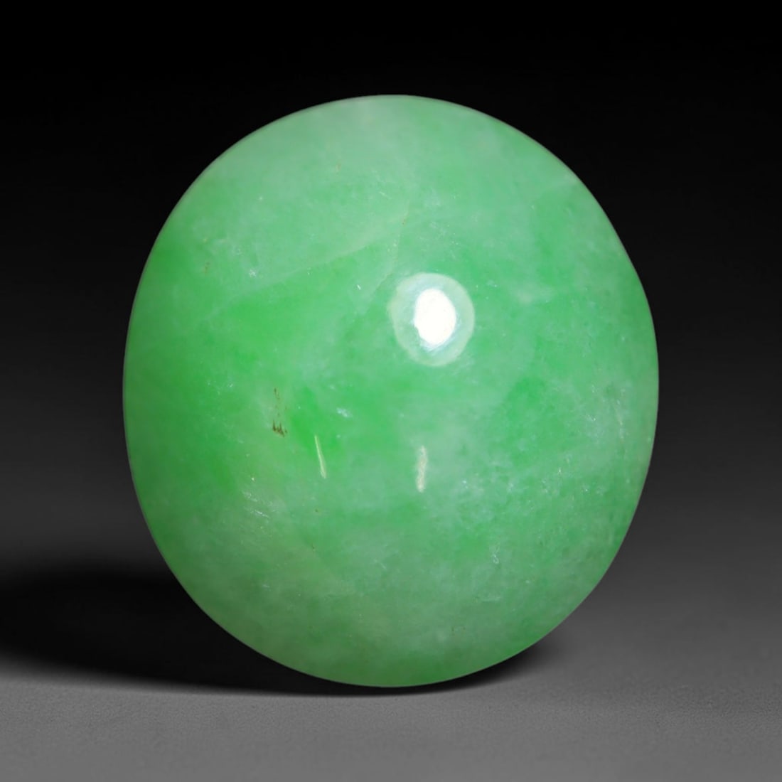 4.14ct Natural Burmese Type A Jadeite Jade Cabochon Loose Gemstone, 41BT: This smoothly polished cabochon is genuine Type A Burmese jadeite jade. It displays soft, even green saturation with gentle natural tonal variation across the polished surface, featuring a fine compac