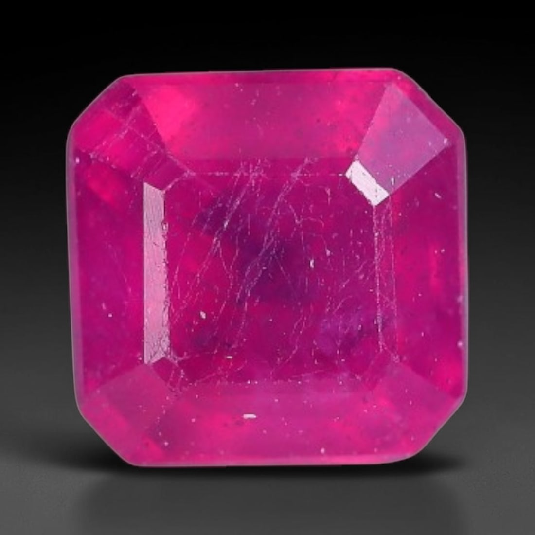 1.03 Carats Natural Madagascar Vivid Fuchsia Red Heated Ruby Loose Gemstone, 13AH: This vivid fuchsia red Madagascar ruby displays rich saturated red tone with subtle natural internal mineral traces that showcase genuine earth-grown character, measured at 5.2x3.7mm, the intense warm