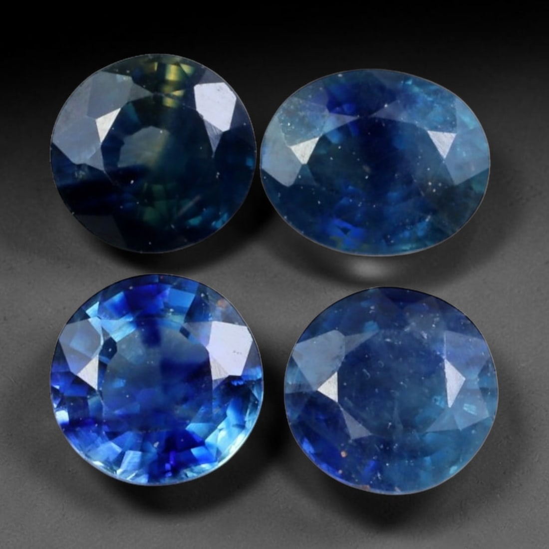 2.07ct Natural Australian Blue Sapphire Loose Gemstone Parcel, 92BV: This parcel consists of natural blue sapphire originating from Australia. The stones display varied cool blue tonal variation across the crystal material, polished with fine faceting to maximise light