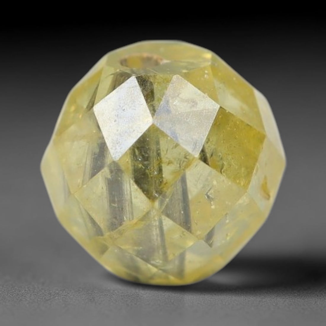 0.39ct Natural Fancy Faceted Diamond Bead Loose Gemstone, 90BE: This fully polished natural fancy diamond bead features warm pale yellowish crystalline body tone with abundant native mineral inclusions captured within its structure, measured at calibrated dimensio