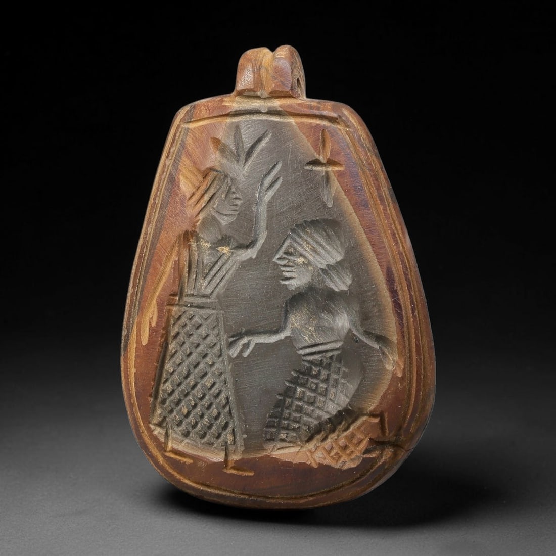 Vintage Natural Carnelian Agate Revival Indo-Persian Glyptic Figural Talisman Amulet Plaque, 64FK: This vintage talisman pendant plaque is skillfully carved from natural banded carnelian agate, crafted in a style referencing ancient Indo-Persian glyptic art traditions. The face bears detailed relie
