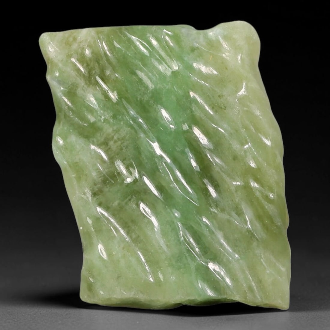 120ct Natural Type A Burmese Jadeite Jade Polished Sliced Rough, 77AZ: This specimen is a sliced rough block of natural Type A Burmese jadeite jade. The interior displays natural colour zoning with visible mineral veining and crystalline patterns typical of unprocessed j