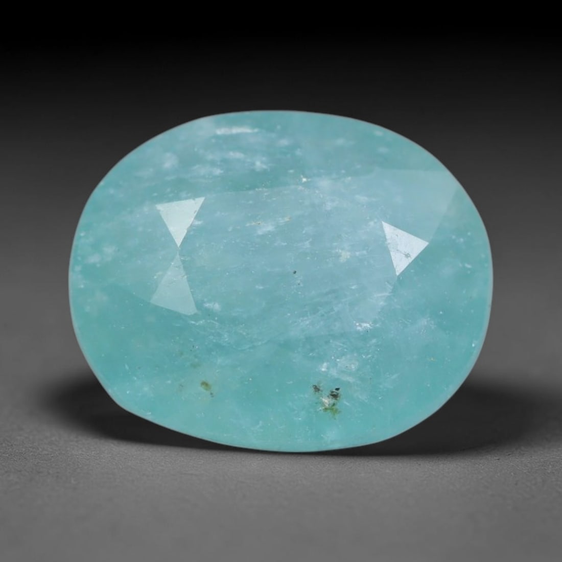 3.83ct Natural Madagascan Faceted Grandidierite Rare Loose Gemstone, 64BD: This expertly faceted finished grandidierite holds soft translucent body tone with fine faint natural internal veining visible beneath precisely cut reflective facets within its 10.9x8.9x5.7mm calibra