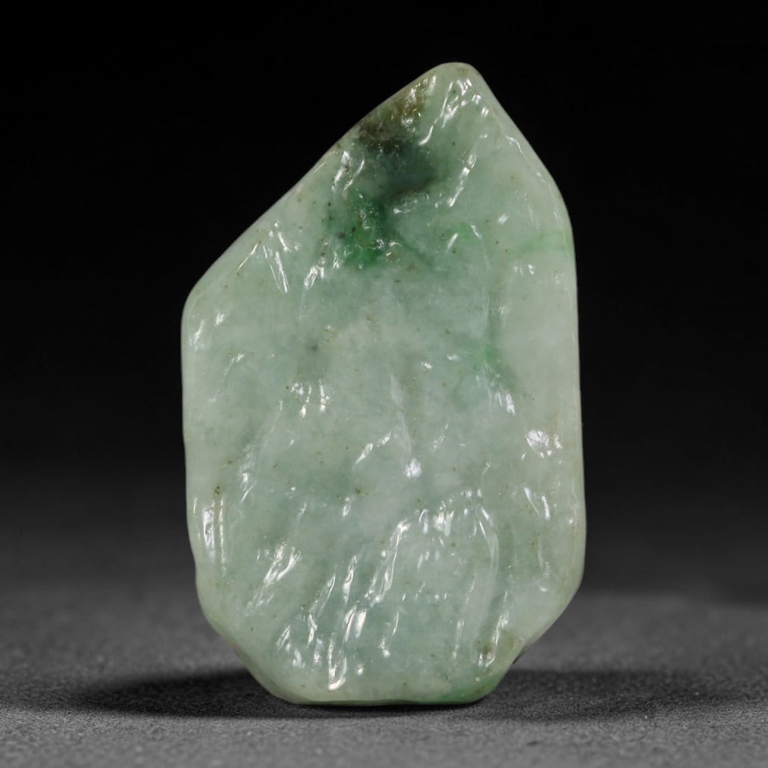255ct Natural Type A Burmese Jadeite Jade Polished Sliced Rough, 75AZ: This specimen is a sliced rough block of natural Type A Burmese jadeite jade. The interior displays natural colour zoning with visible mineral veining and crystalline patterns typical of unprocessed j