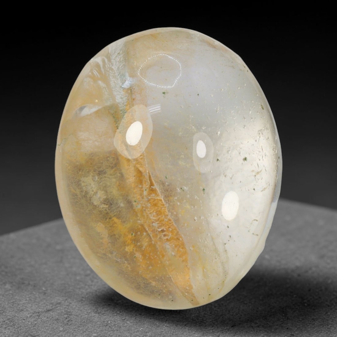 30ct Natural Brazilian Phantom Quartz Oval Cabochon Loose Gemstone, 63BM: This smoothly polished cabochon of natural phantom quartz preserves delicate layered phantom crystal formations enclosed inside transparent quartz host. The domed polished surface offers unobstructed 