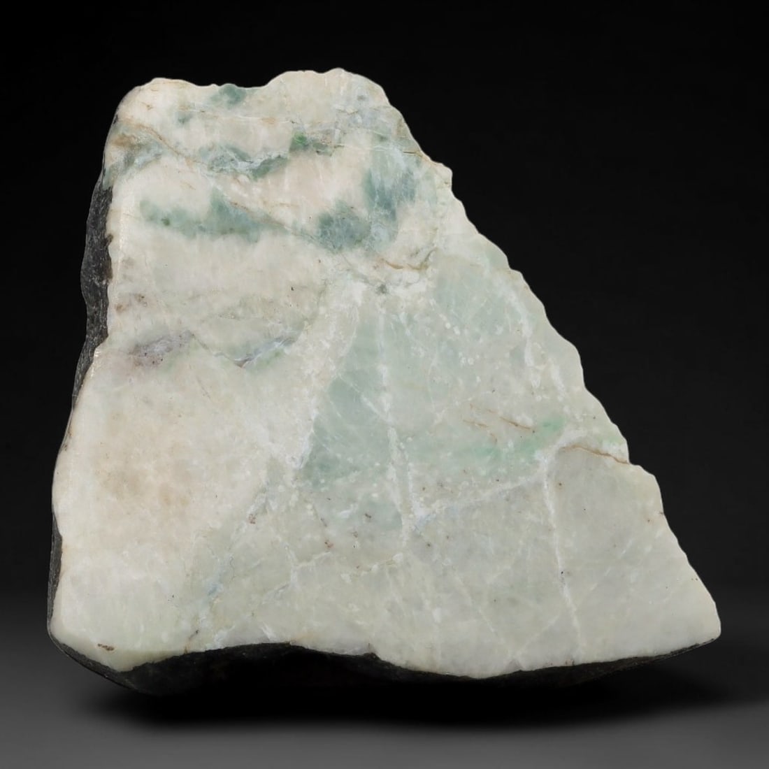 183ct Natural Type A Burmese Jadeite Jade Sliced Rough, 41AZ: This specimen is a sliced rough block of natural Type A Burmese jadeite jade. The interior displays natural colour zoning with visible mineral veining and crystalline patterns typical of unprocessed j