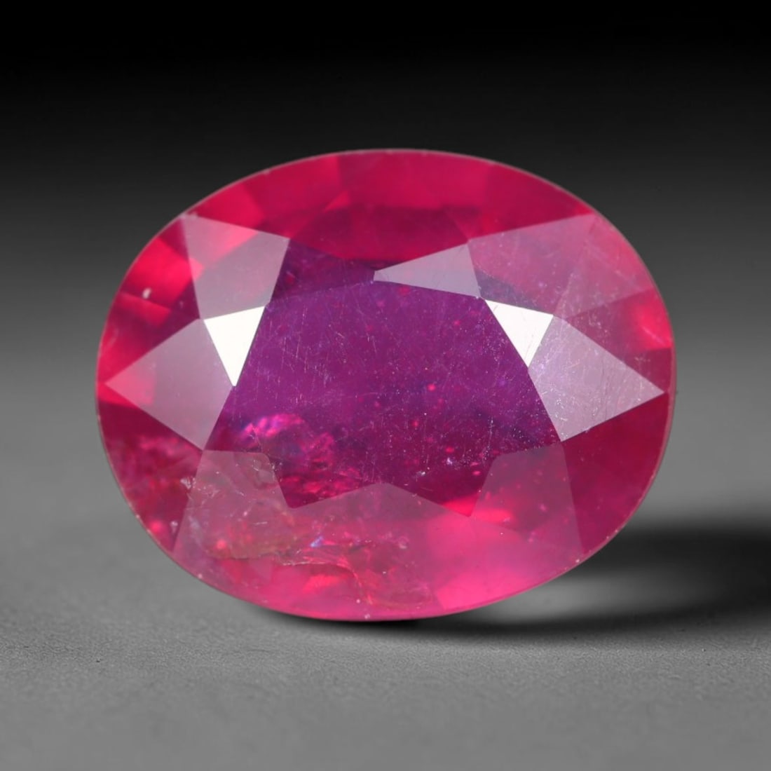 3.80ct Natural Madagascar Vivid Magenta Red Ruby Loose Gemstone, 42BA: This vivid magenta-hued Madagascar ruby boasts rich saturated red-pink saturation scattered with tiny fine mineral specks and distinct two-phase fluid bubble inclusions throughout its translucent crys