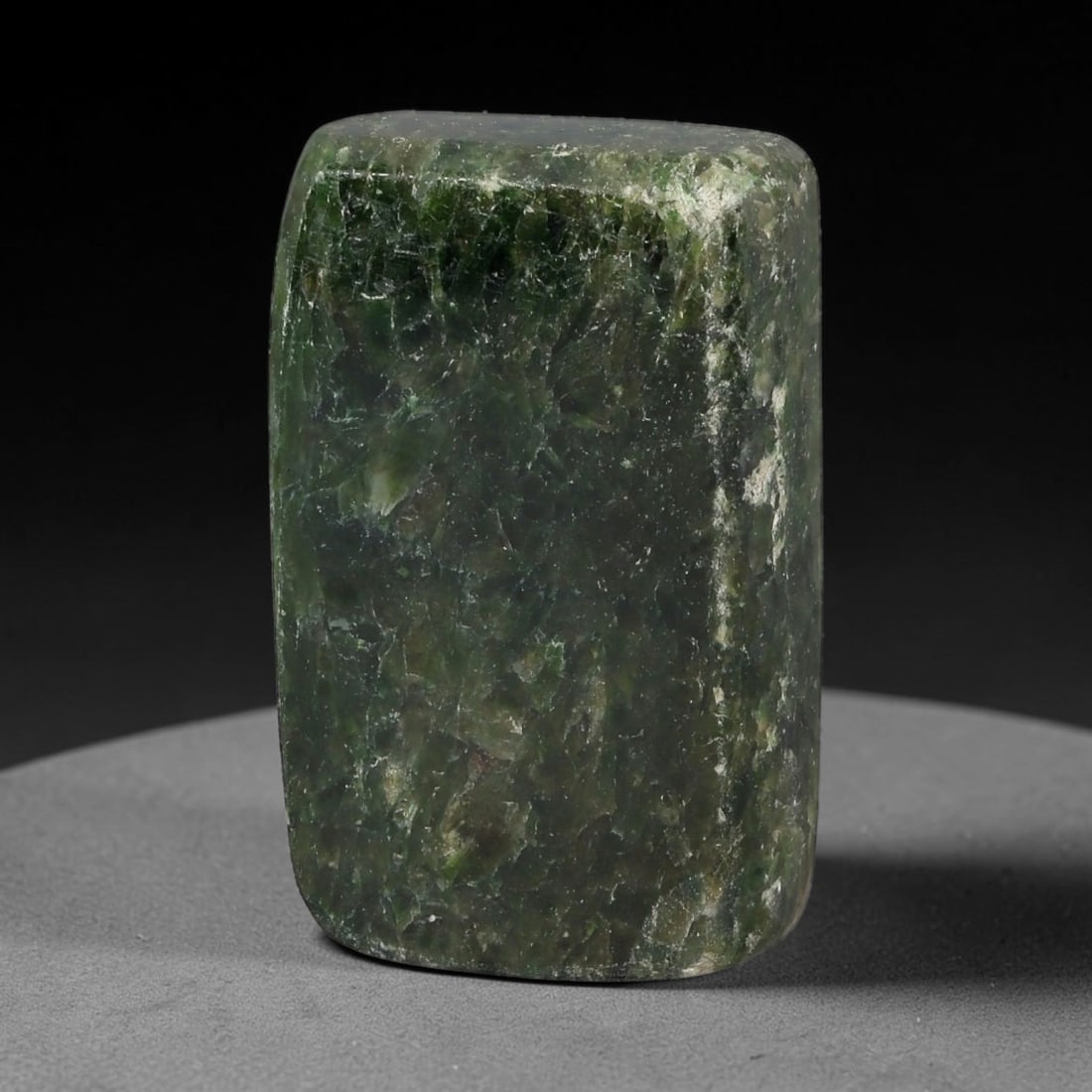 215ct Natural Type A Burmese Jadeite Jade Sliced Rough, 37FD: This specimen is a sliced rough block of natural Type A Burmese jadeite jade. The interior displays natural colour zoning with visible mineral veining and crystalline patterns typical of unprocessed j