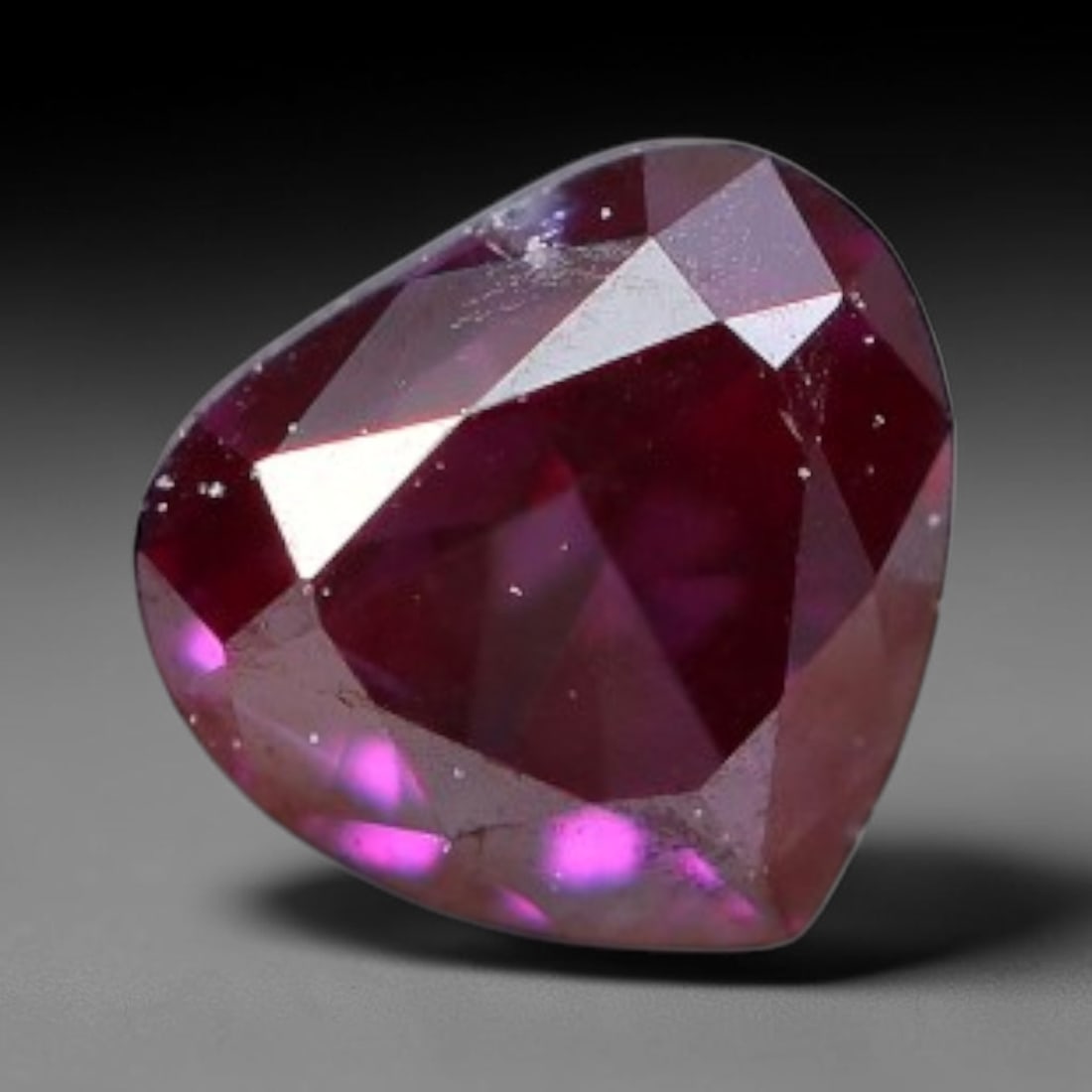0.10ct Natural Fancy Pinkish Purple Diamond Loose Gemstone, 24BG: This polished natural diamond displays rich pinkish-purple body saturation, with subtle fine microscopic mineral specks distributed within its crystal interior, measured at calibrated dimensions of 3x