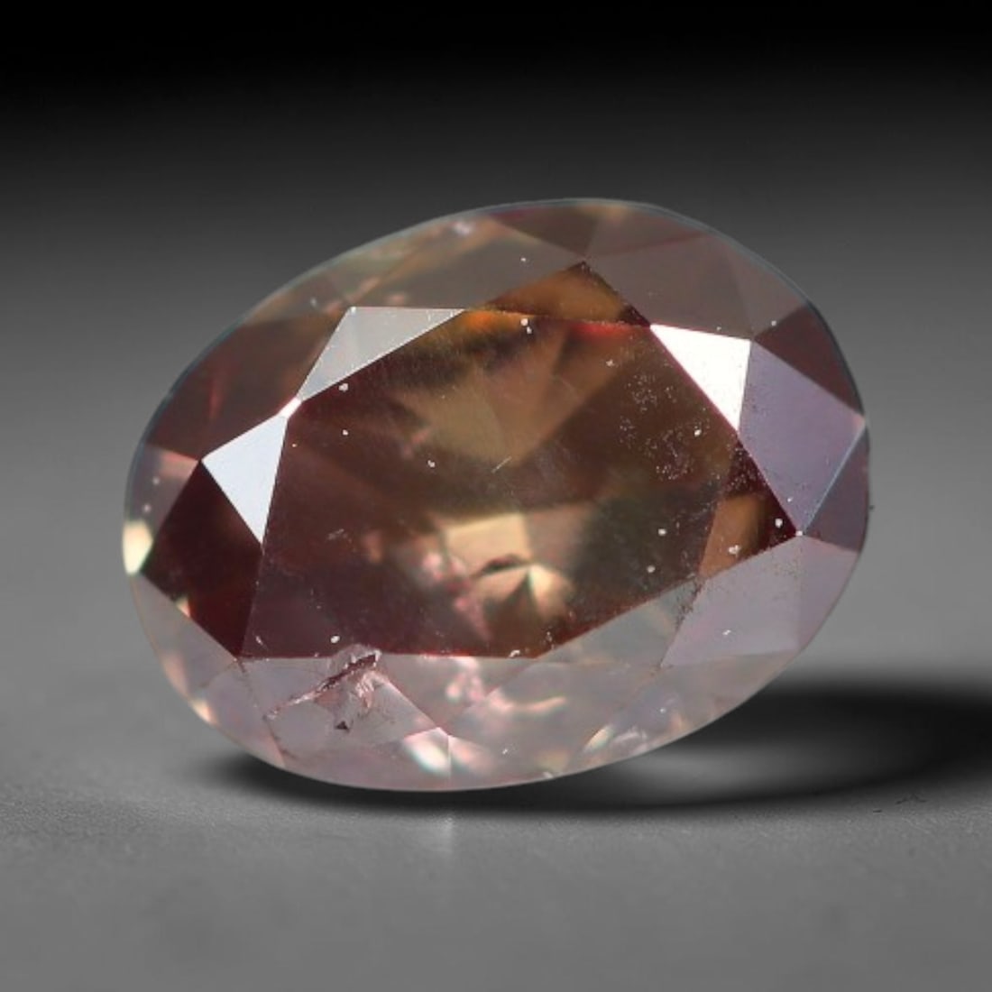 0.24ct Natural Fancy Pinkish Purple Diamond Loose Gemstone, 9BH: This polished natural diamond displays rich pinkish-purple body saturation, with subtle fine microscopic mineral specks distributed within its crystal interior, measured at calibrated dimensions of 4.