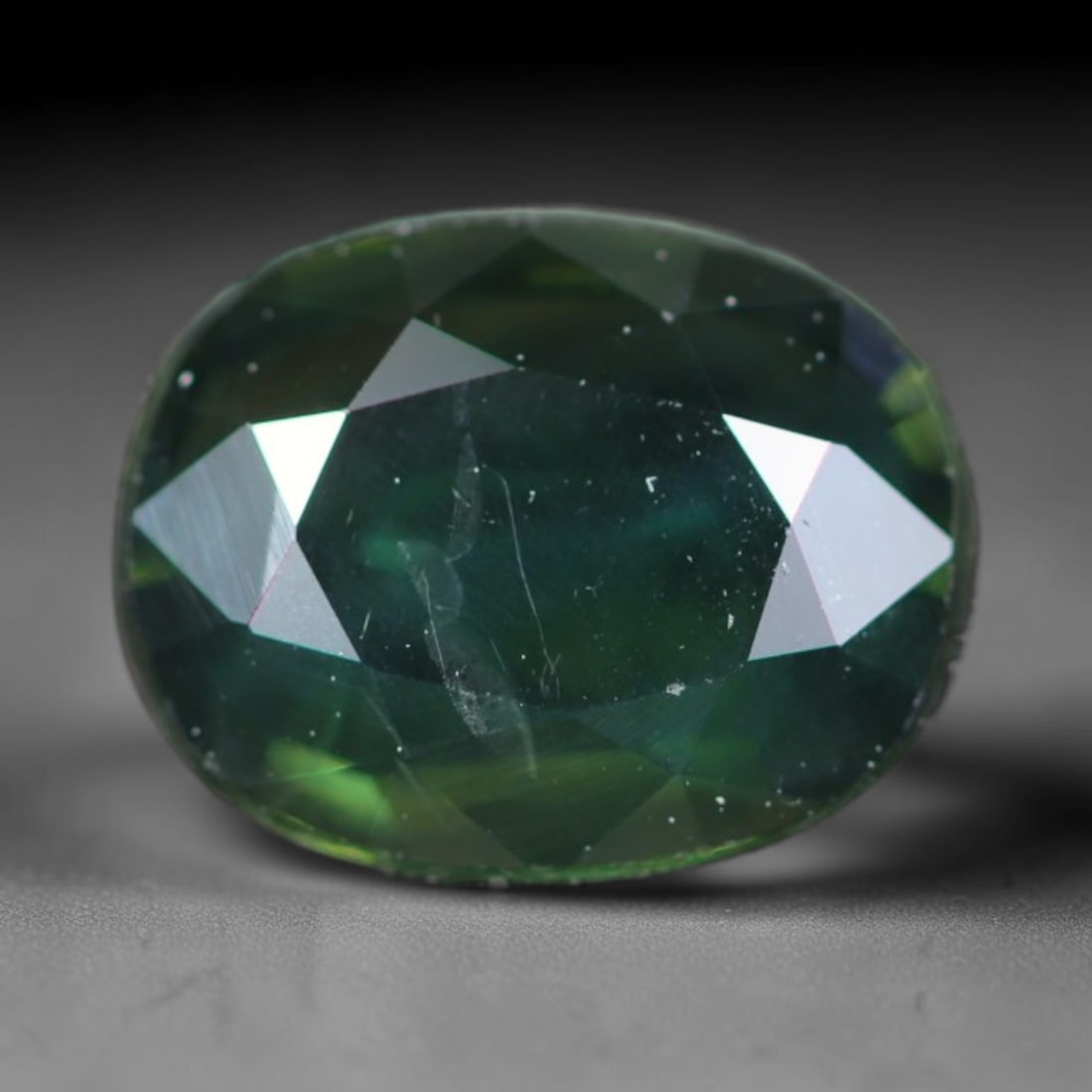1.17ct Natural Australian Teal Faceted Sapphire Loose Gemstone, 28BA: This skillfully faceted sapphire features rich saturated body tone with fine microscopic mineral inclusions scattered evenly across its polished reflective planes within its 7.7x6.1x2.5mm calibrated d