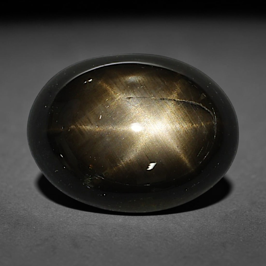 2.61ct Natural Siamese 6-Ray Black Star Sapphire Loose Gemstone, 32BD: This polished star sapphire originates from classic Siamese mining deposits, featuring a deep dark crystalline base with fine native mineral traces trapped within its structure, sized at calibrated 9.