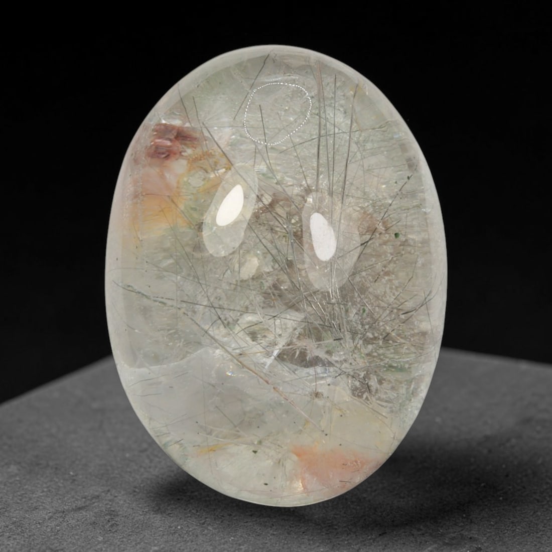 24ct Natural Brazilian Phantom Quartz Oval Cabochon Loose Gemstone, 7BM: This smoothly polished cabochon of natural phantom quartz preserves delicate layered phantom crystal formations enclosed inside transparent quartz host. The domed polished surface offers unobstructed 