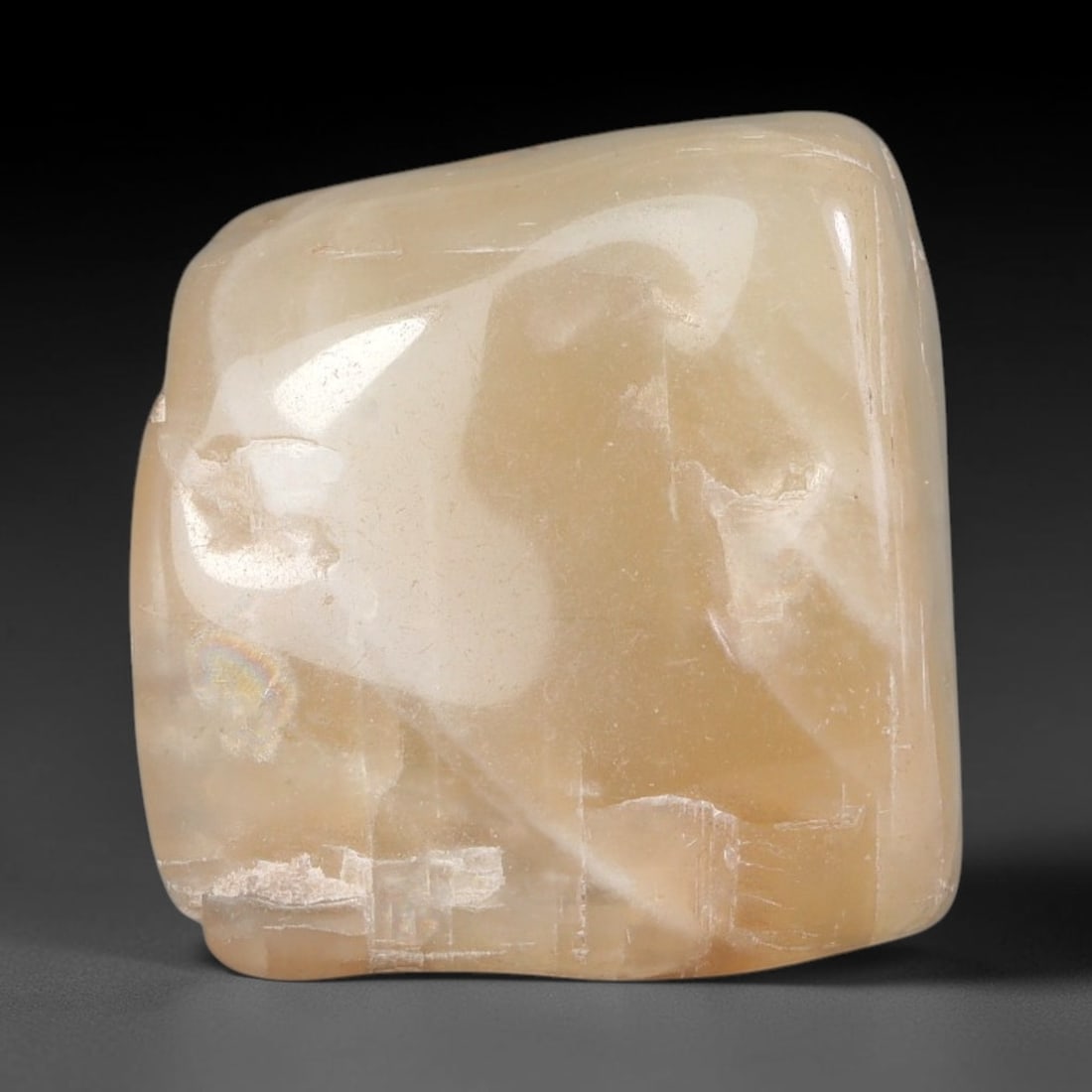 74ct Natural Ceylon Pale Cream White Moonstone Rough, 61AH: This smooth weathered moonstone rough carries soft pale cream white translucency with subtle internal silvery adularescent shimmer locked within its naturally tumbled surface, fine faint mineral veini