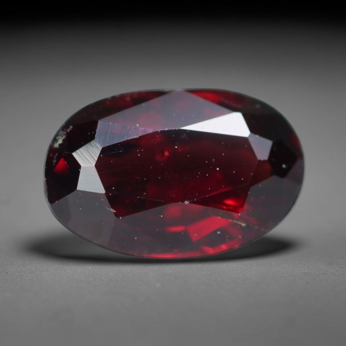 2.63ct Natural Mozambican Deep Crimson Red Faceted Almandine Garnet Loose Gemstone, 66BD: This meticulously faceted garnet features a dense, rich red crystalline body dotted with subtle micro mineral inclusions scattered evenly throughout its transparent interior, precision-cut reflective 