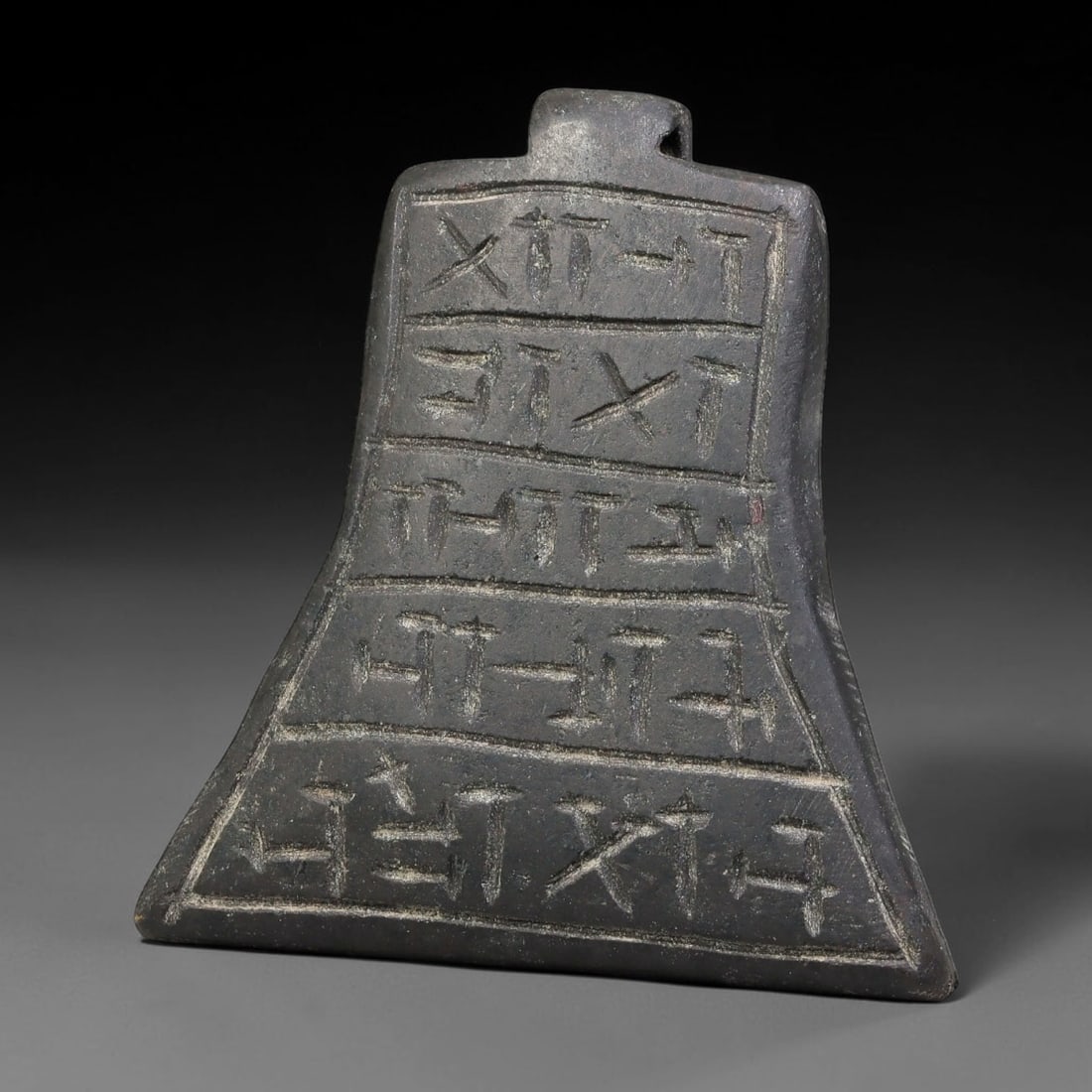 Vintage Uruk Revival Carved Stone Cuneiform Talisman Pendant Plaque, 34FK: This vintage pendant is hand-carved from dark mineral stone, designed in revival style inspired by ancient Uruk glyptic traditions. The surface features neatly arranged horizontal bands of stylized cu