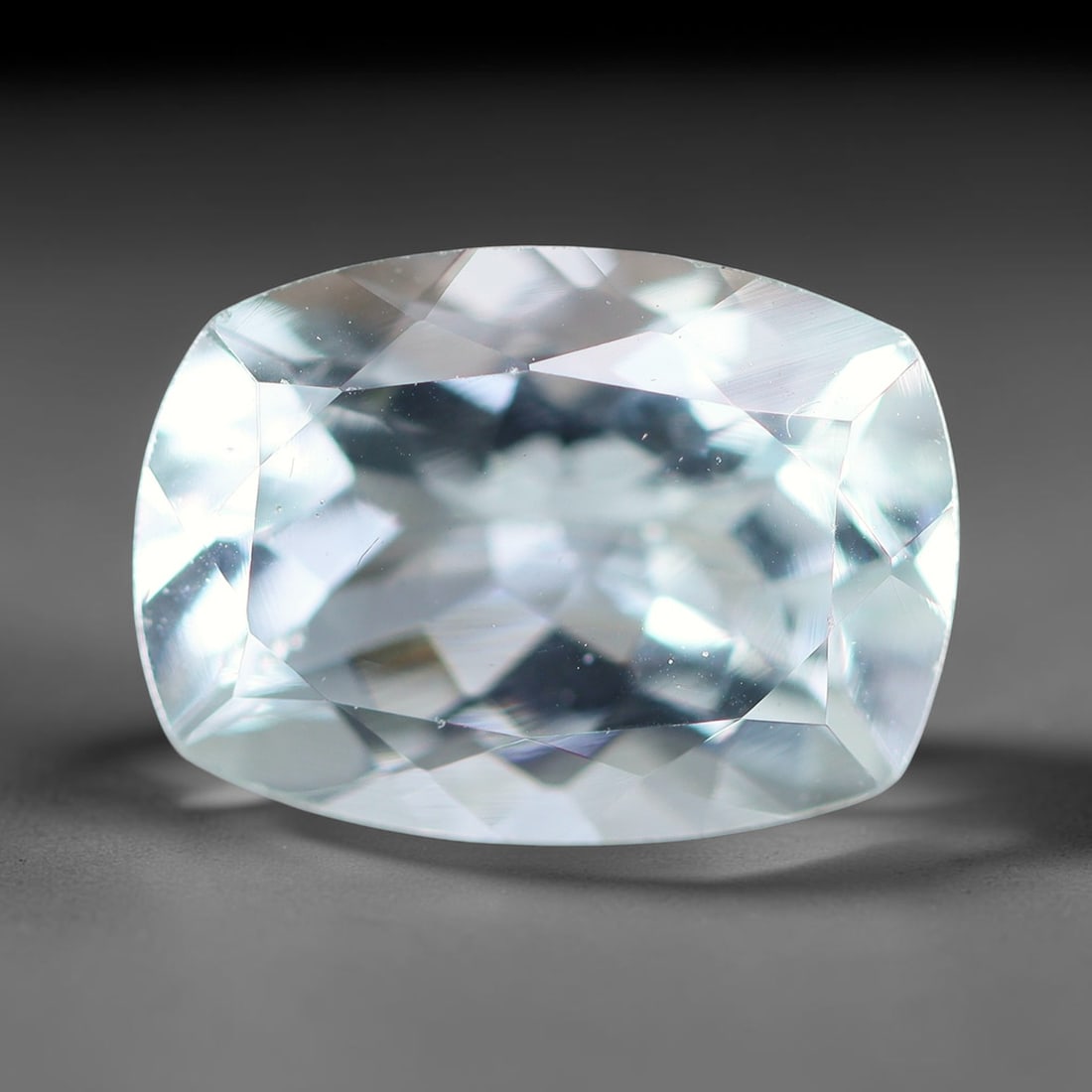 2.39ct Natural Brazilian Sky Blue Faceted Aquamarine Loose Gemstone, 12BF: This precisely faceted aquamarine boasts clear translucent pale sky blue body tone with subtle thin mineral needle and tiny scattered crystalline specks visible within its polished reflective planes i