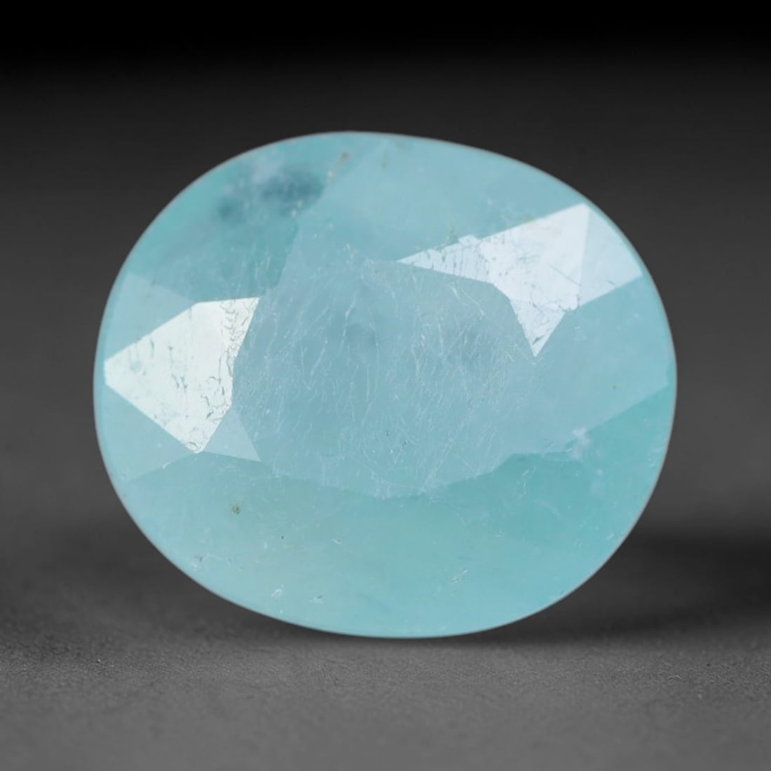2.81ct Natural Madagascan Faceted Grandidierite Rare Loose Gemstone, 72AS: This expertly faceted finished grandidierite holds soft translucent body tone with fine faint natural internal veining visible beneath precisely cut reflective facets within its 9.8x8.5x5mm calibrated