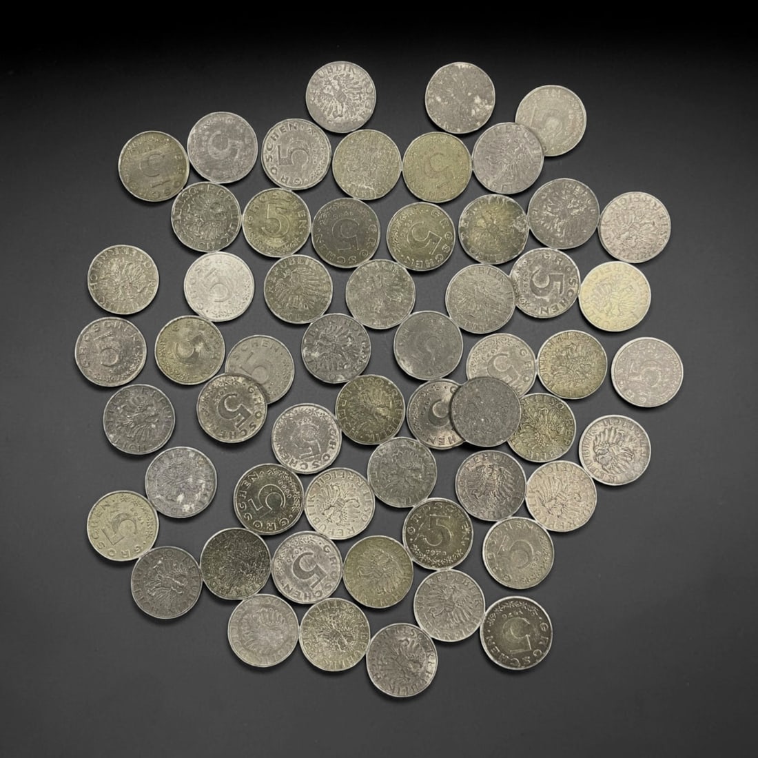 AUSTRIA: Imperial Eagle - 5 Groschen Bulk Coin Lot, 11V: This bulk lot of Austrian 5 Groschen coins features the iconic imperial eagle motif, a powerful symbol of Austro-Hungarian sovereignty. The reverse displays the bold numeral "5 GROSCHEN," while the ob