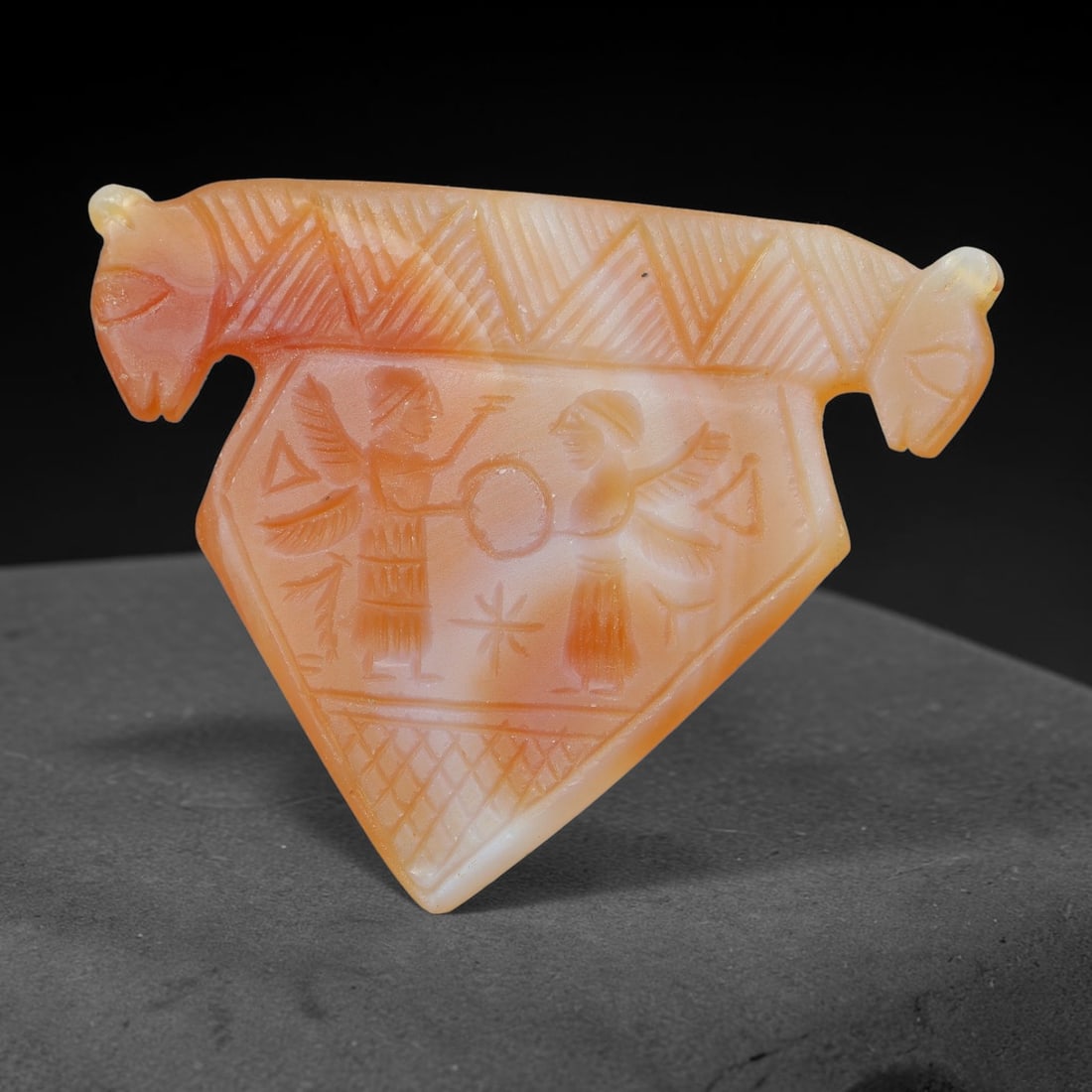 Vintage Natural Carnelian Agate Revival Indo-Persian Glyptic Figural Talisman Amulet Plaque, 27FK: This vintage talisman pendant plaque is skillfully carved from natural banded carnelian agate, crafted in a style referencing ancient Indo-Persian glyptic art traditions. The face bears detailed relie