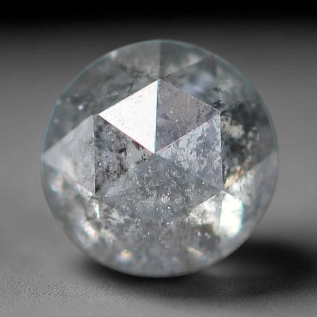 0.18ct Natural Untreated Salt And Pepper Round Rose Cut Diamond Loose Gemstone, 65BH: This polished natural salt and pepper diamond features a translucent pale base naturally scattered with distinctive dark mineral speckles and inclusions throughout its crystal interior, measured at ca